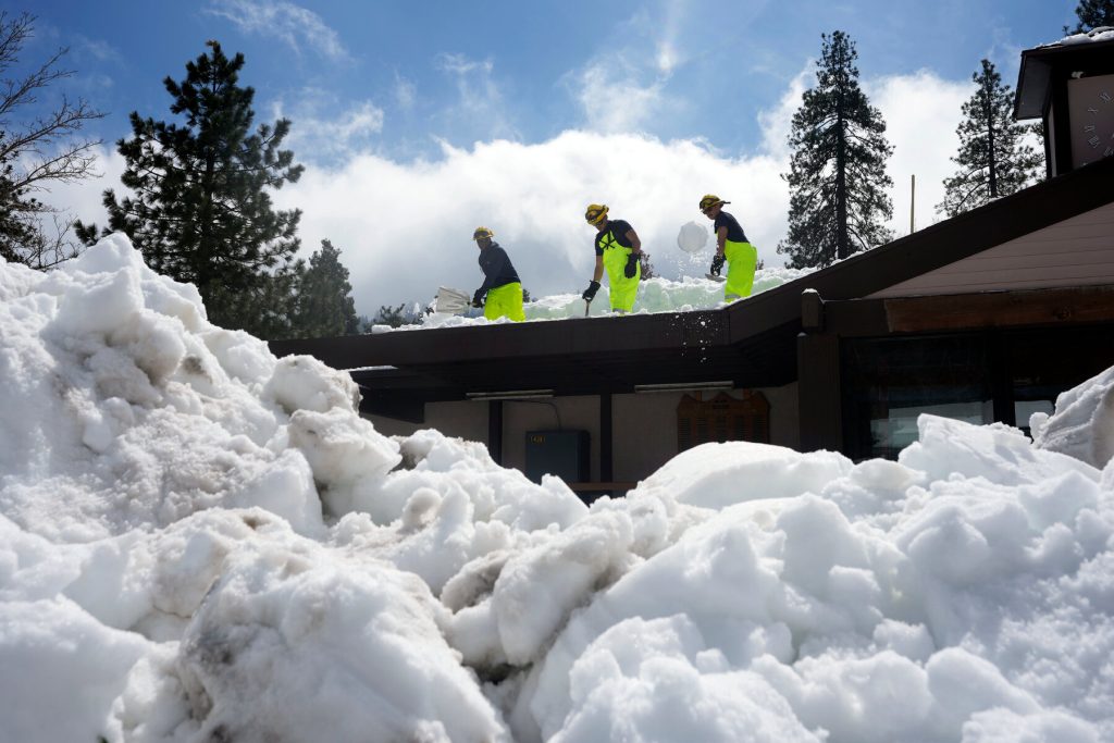 clearing a roof of snow in tahoe