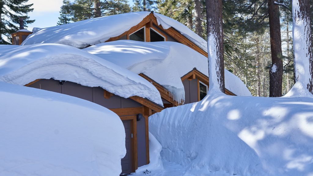 snow on a house in tahoe